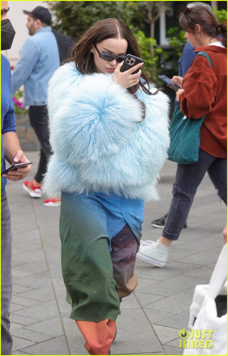dove cameron wears fluffy blue jacket while out in london 10