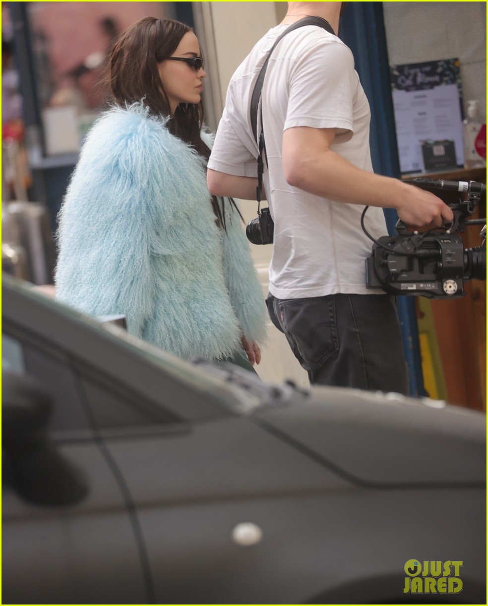 dove cameron wears fluffy blue jacket while out in london 12
