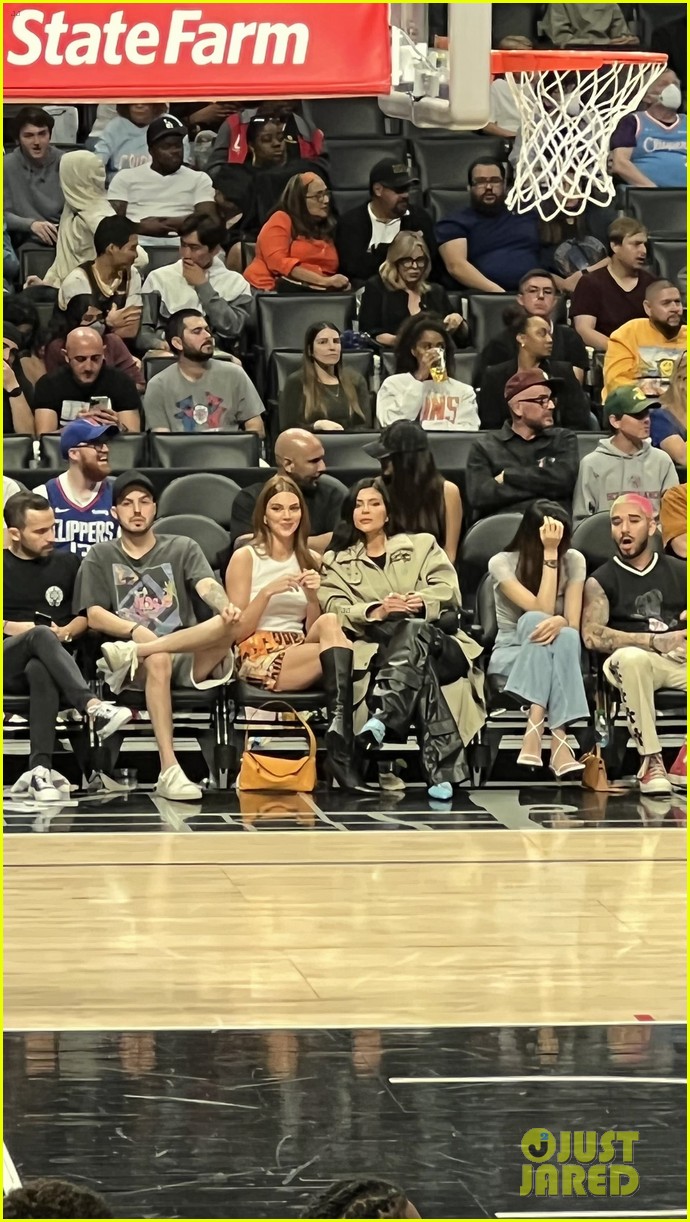 kendall jenner kylie jenner sit courtside at game 14