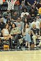 kendall jenner kylie jenner sit courtside at game 17