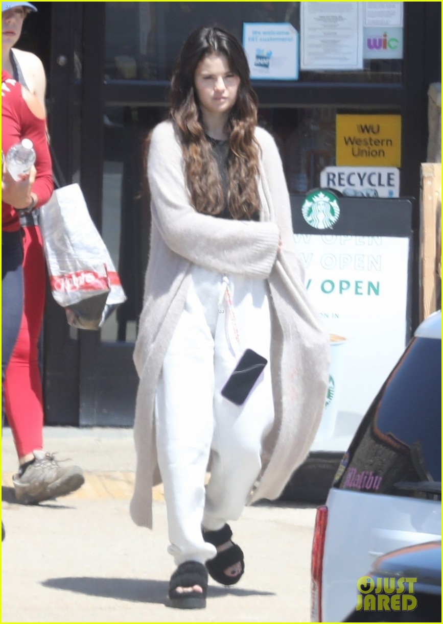 Selena Gomez in chic bathrobe