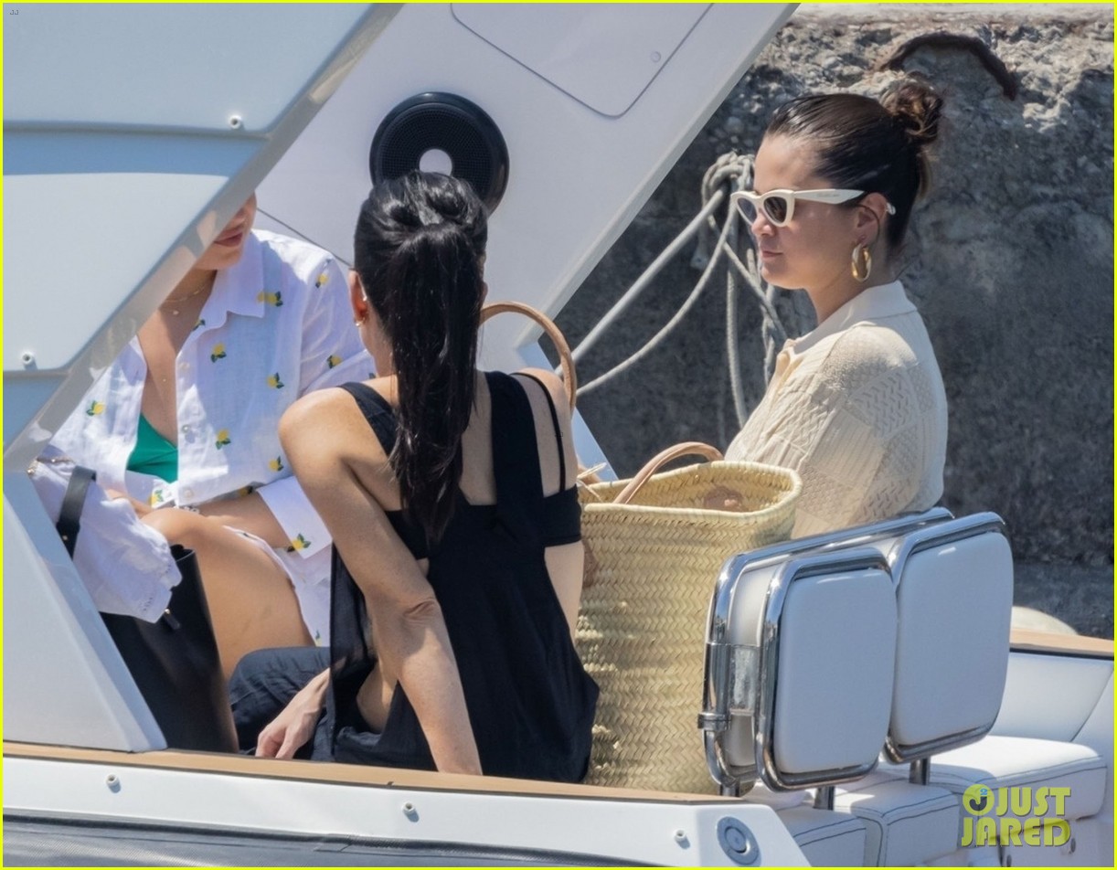 selena gomez gets help from andrea iervolino boarding yacht italy 27