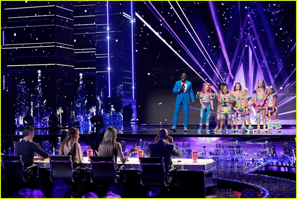 xomg pop give electrifying performance of merry go round on agt 18