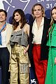 harry styles joins dont worry darling costars at venice film festival photo call 03