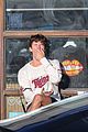shawn mendes picks up coffee after attending halloween horror nights 01