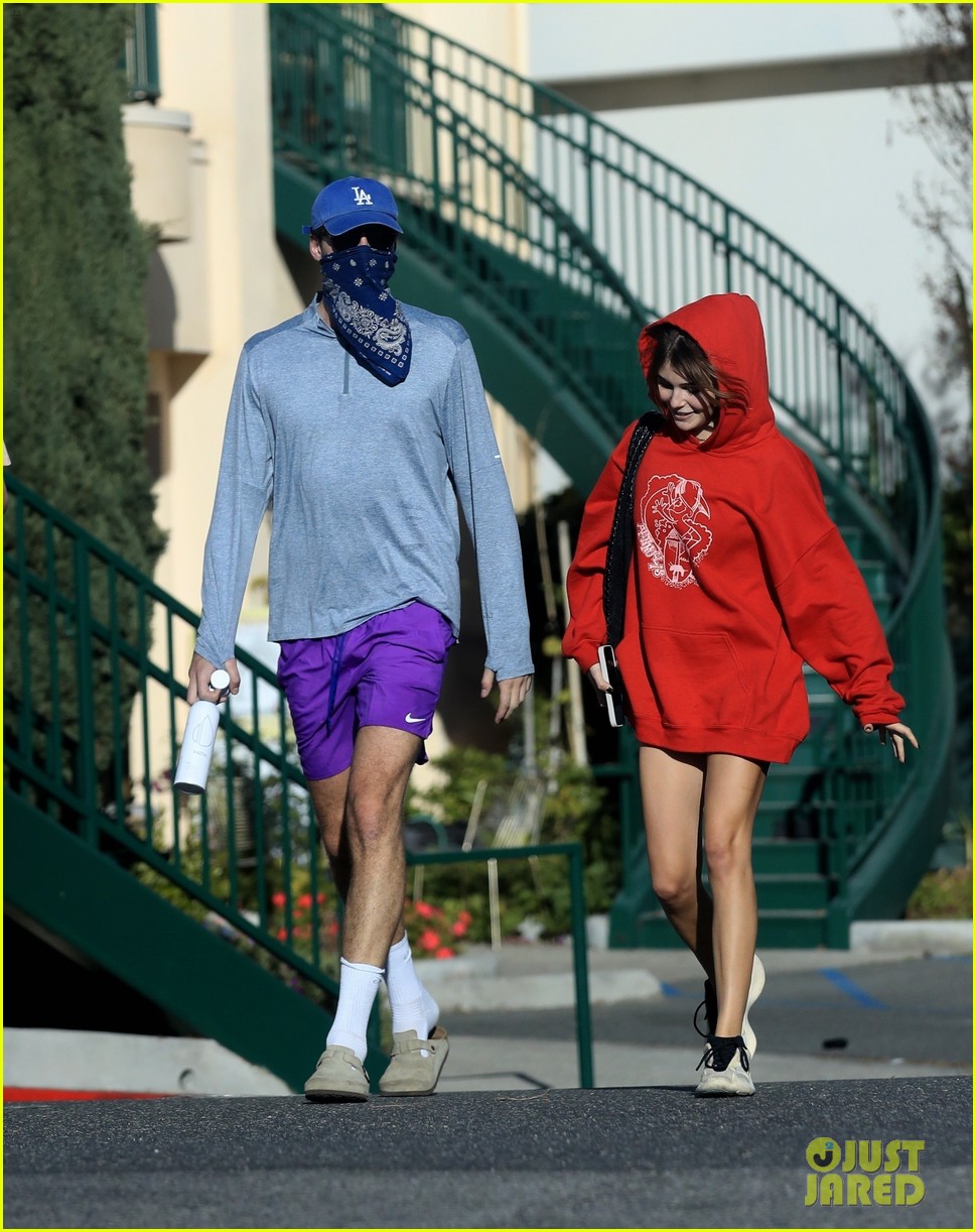 jacob elordi olivia jade cover their faces for outings 03