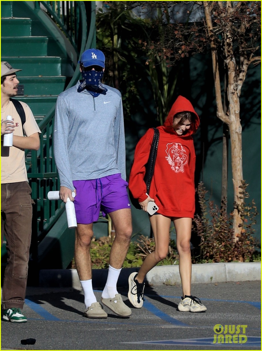 jacob elordi olivia jade cover their faces for outings 38