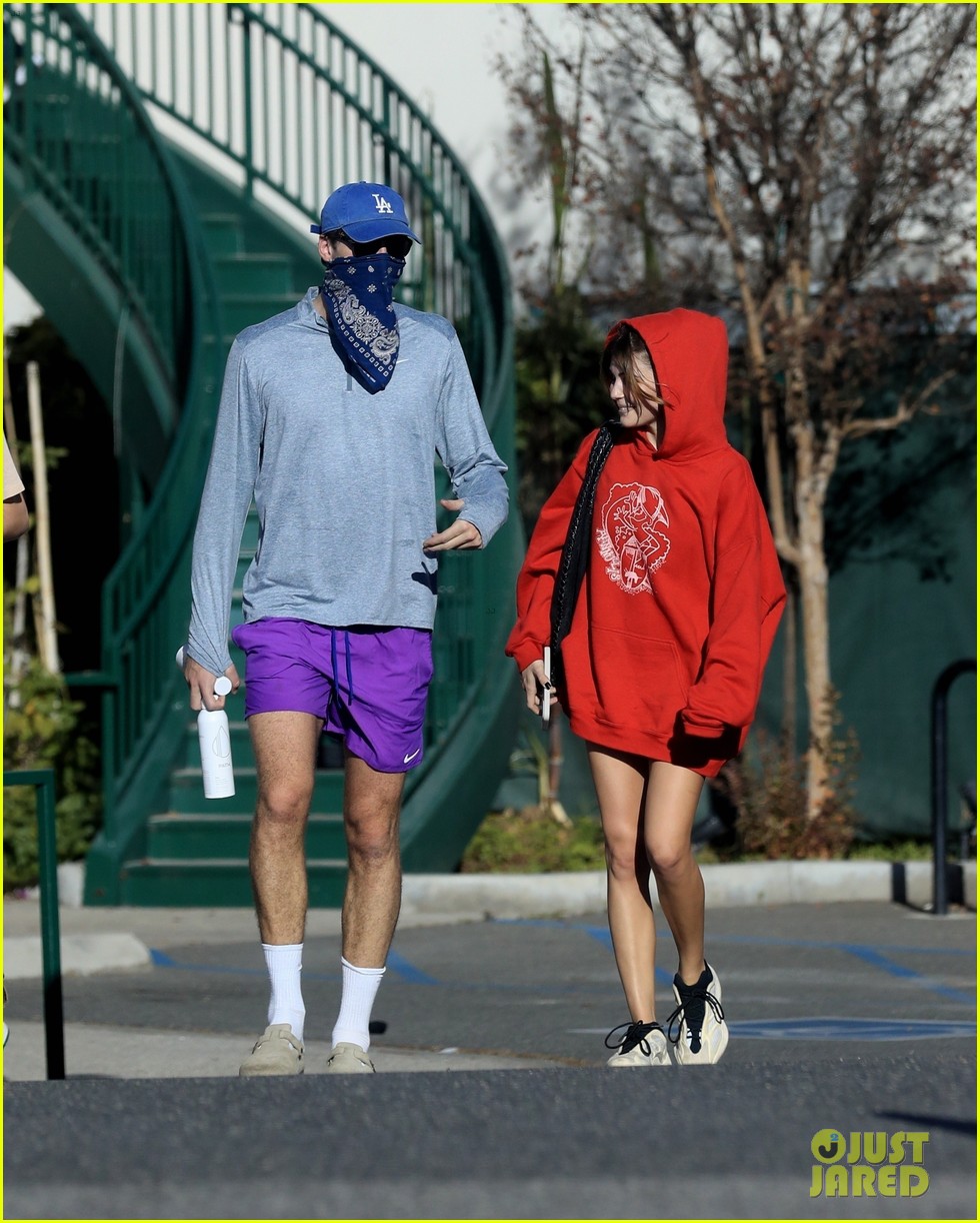 jacob elordi olivia jade cover their faces for outings 46