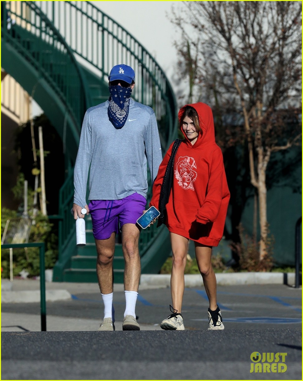 jacob elordi olivia jade cover their faces for outings 50