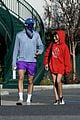 jacob elordi olivia jade cover their faces for outings 47