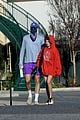 jacob elordi olivia jade cover their faces for outings 54