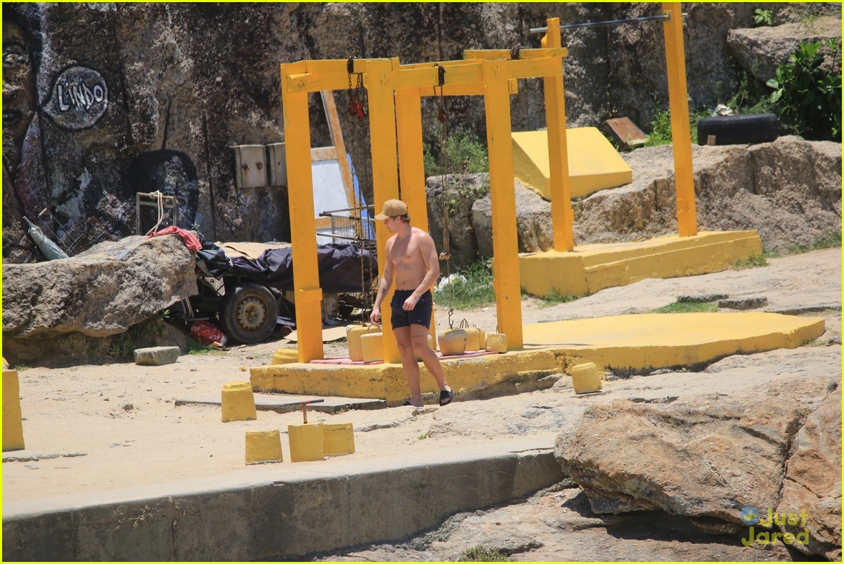 charlie gillespie owen patrick joyner get in shirtless workout at the beach 25