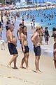 charlie gillespie owen patrick joyner get in shirtless workout at the beach 45