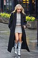 sabrina carpenter wears silver boots on rainy london day 03