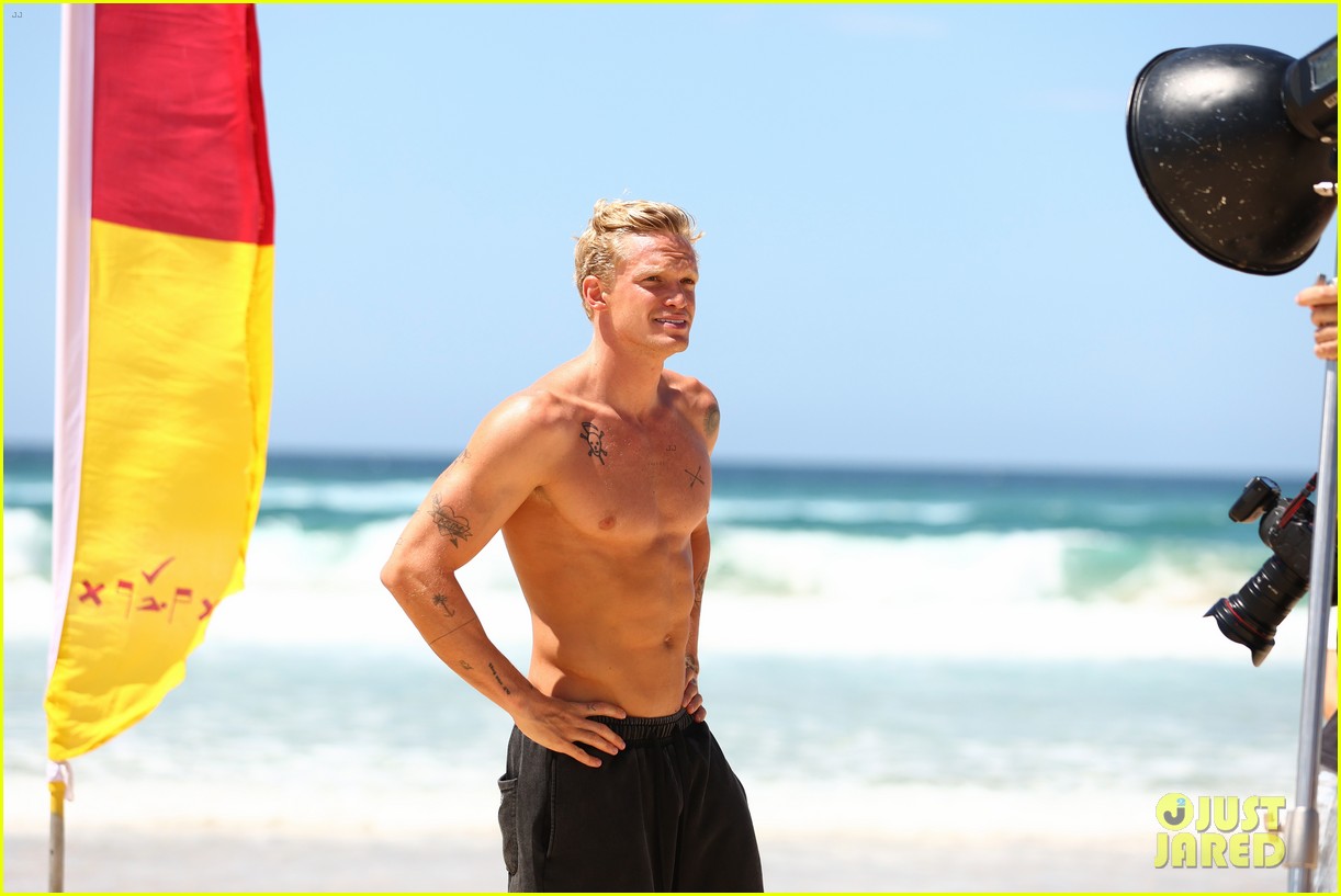 cody simpson shirtless beach cleanup 05