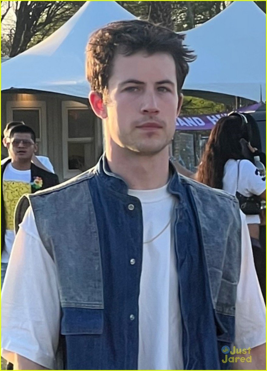 dylan minnette holds hands with model isabella elei at coachella weekend one 03