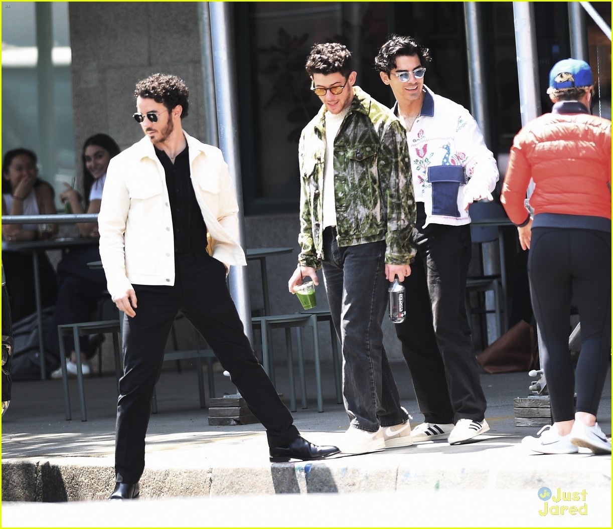 Jonas Brothers Run Into Fan While Out In NYC Between Meetings Photo