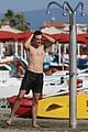 louis partride soaks up the sun during time off in italy 16