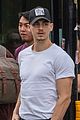 hero fiennes tiffin shows off muscles in tight t shirt during london outing 01
