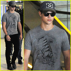 Taylor Lautner Visits France with His Father