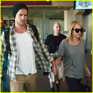 Miley Cyrus & Liam Hemsworth: Airport Arrival with Ziggy!