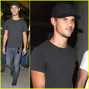 Taylor Lautner: Black Ball Cap at LAX