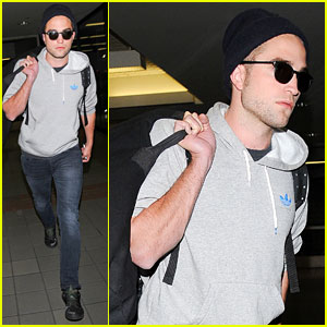 Robert Pattinson Lands at LAX Airport