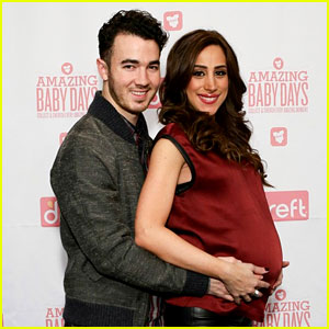 Kevin Jonas Holds Danielle's Large Baby Bump at App Launch Event!