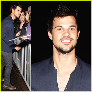 Taylor Lautner Stops For Fans After Private Pre-Oscars Party