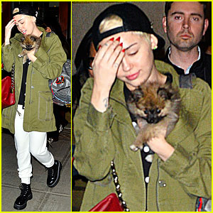 Miley Cyrus Carries New Pup Moonie, Still in 'Excruciating Pain' Over Floyd's Death