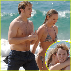 Shirtless Sam Claflin Frolics on Hawaiian Beach with Wife Laura Haddock