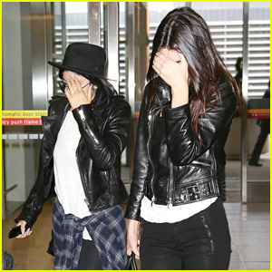 Kendall & Kylie Jenner Cover Faces Inside Airport After MMVAs