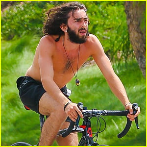 Mateo Arias Takes a Shirtless Bike Ride with a Full Beard & Long Hair