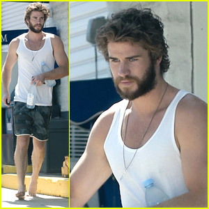 Liam Hemsworth Goes Barefoot For Water Run