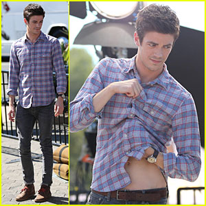 Grant Gustin Shows His Belly Button Before Taping 'Extra'
