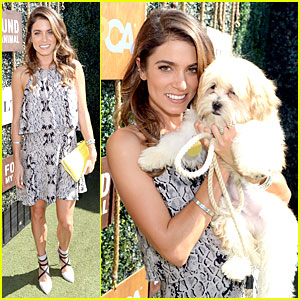 Nikki Reed Cuddles Adorable Adoptable Puppy at Dog Leash And Collar Launch