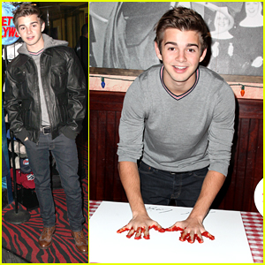 Jack Griffo Double Dips His Hands In Pasta Sauce For Buca di Beppo