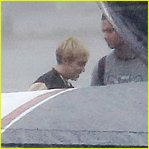 Miley Cyrus & Patrick Schwarzenegger Hit Rain Before Private Flight Out of Los Angeles