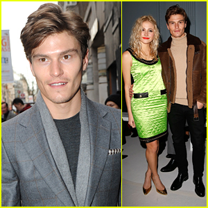 Oliver Cheshire Brings Pixie Lott To Moschino Show During London Collections