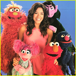 Gina Rodriguez Steals Kisses From Sesame Street's Elmo!