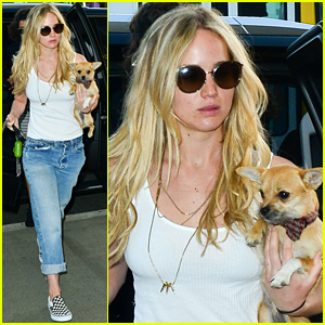 Jennifer Lawrence & Her Bow Tie Clad Pup Catch a Flight Together