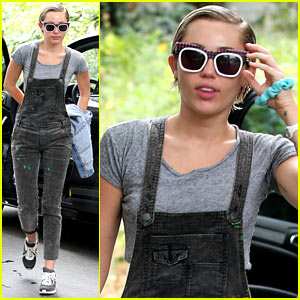 Miley Cyrus Steps Out in Paint Covered Overalls