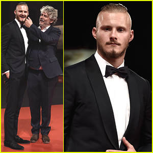 Alexander Ludwig Pretends To Bite Director Daniel Alfredson At 'Go With Me' Premiere in Venice