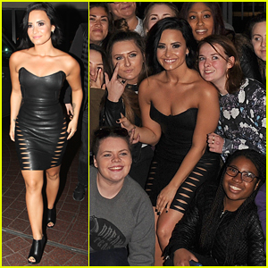 Demi Lovato Takes Group Fan Shots In Hot Leather Dress in London