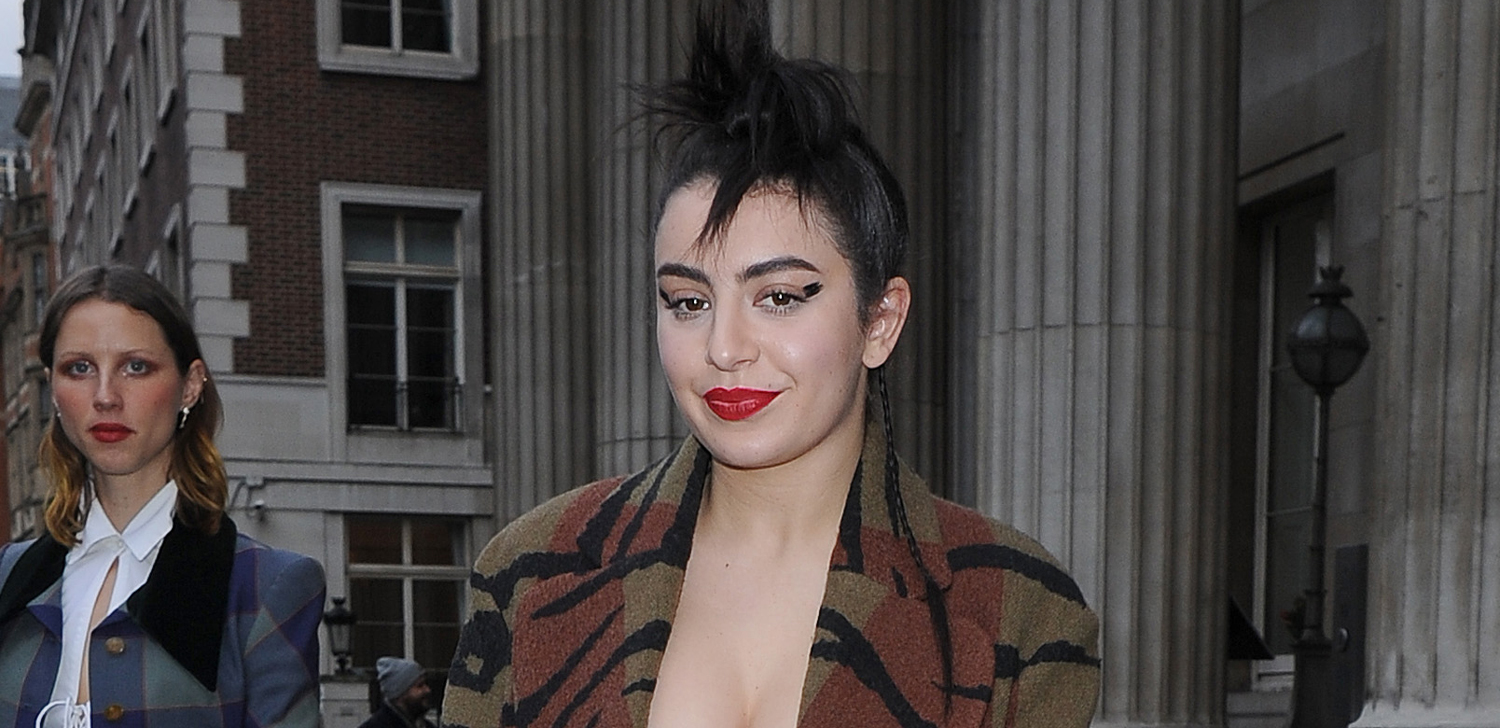 Charli XCX & RJ Mitte Pose Together During London Fashion Week