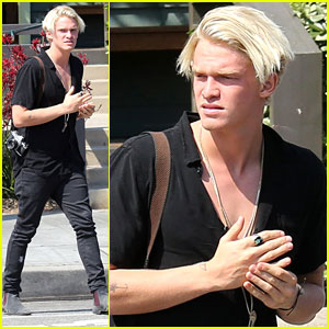 Cody Simpson Crafts Surfboard For Friend
