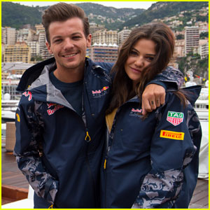 Louis Tomlinson Braves the Rain With Danielle Campbell for F1 Grand Prix