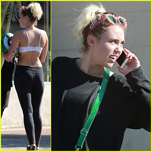 Miley Cyrus Wears Only a Sports Bra While Getting a Mani-Pedi