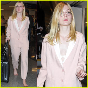 Elle Fanning Arrives at LAX Airport Without Shoes!