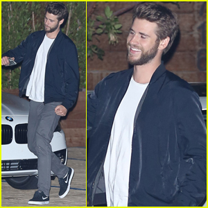 Liam Hemsworth Gets Silly With a Friend After Dinner